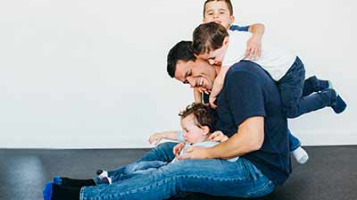 Parent with toddlers and young children