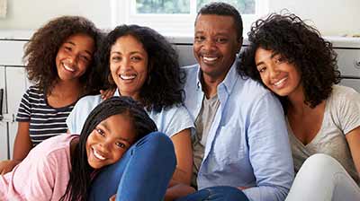 Parents of tweens and teens huddled together